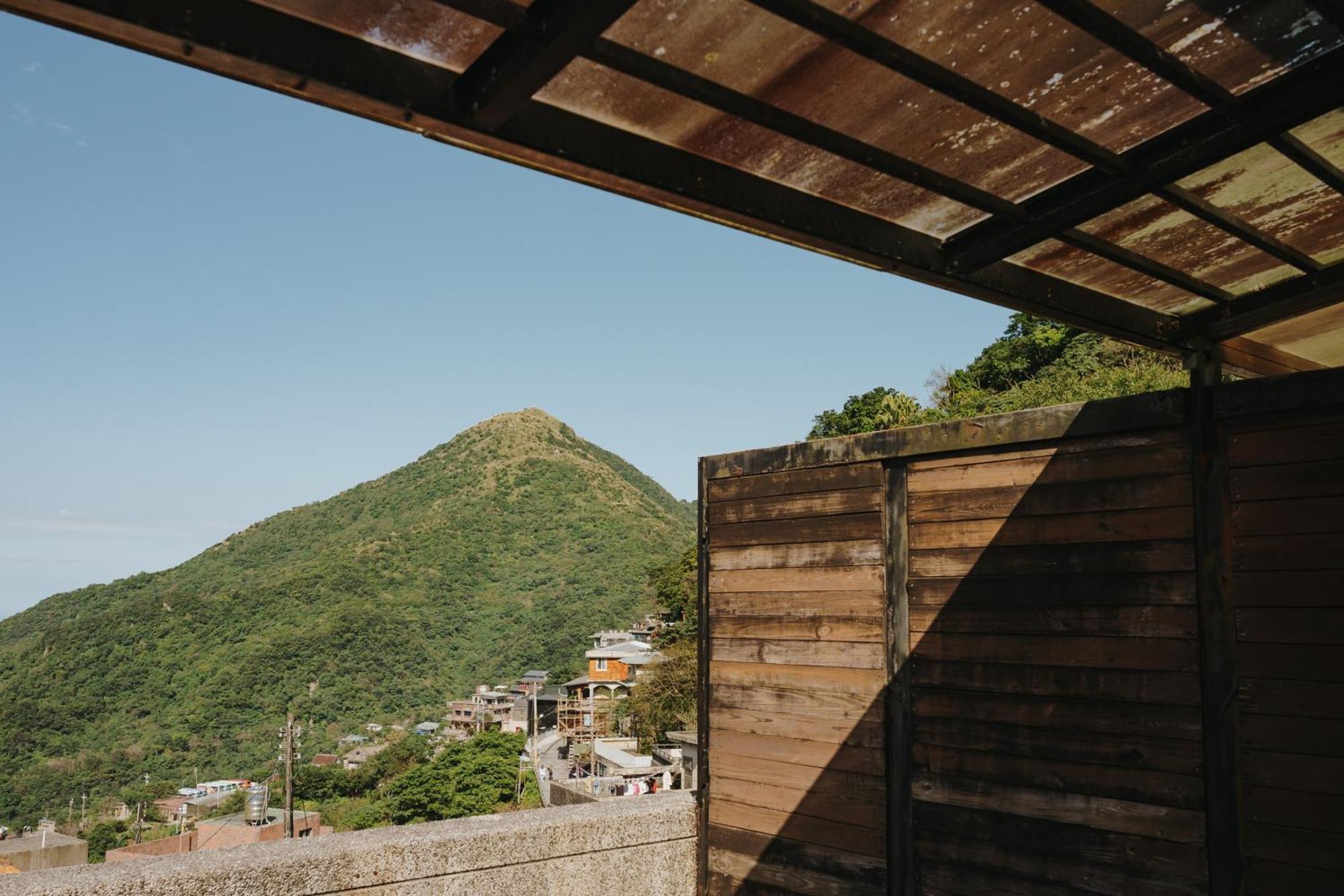 Mountain Traveler Inn Цзюфень Екстер'єр фото